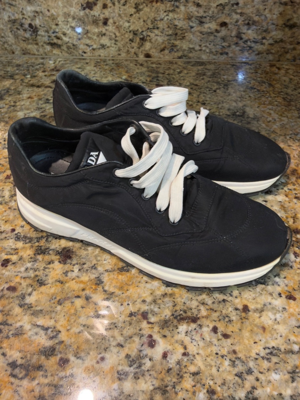Prada women’s Black Sneakers with White Laces